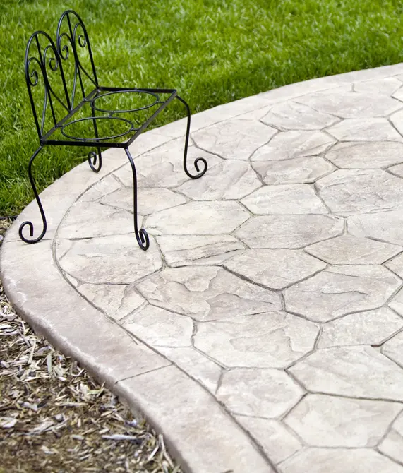 Parrots-Landing-Concrete-Co-stamped-concrete-patio-with-chair-planter